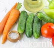 Cucumber salad with carrots and tomatoes